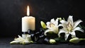 Lily flowers and burning candle on dark background Royalty Free Stock Photo