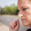 Lily of the valley in the hand of a young woman Royalty Free Stock Photo