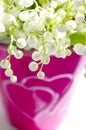 Lily of the valley in a heart vase