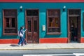 LIMA, PERU - APRIL 12, 2013: An unidentified Chinese tourists walking in Lima. Looking at the map.