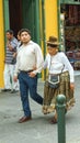 Lima, Peru - 03.01.2019. Couple of man and old woman, people in modern and traditional dress on the street of Lima, capital Peru