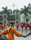 Folk dancers in circle in front of Cathedral Basilica, Lima, Peru