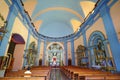 Lima, peru. london, england: brightly colored church interior. praying alone. Royalty Free Stock Photo