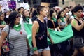 Group of Peruvian woman marching for gender equality at woman`s day march