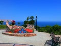 Tiled bench and the Love Statue on a Lima park