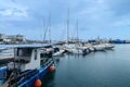 LIMASSOL, CYPRUS - APRIL 15, 2024: Old port of Limassol with beautiful fishing boats at sunset Royalty Free Stock Photo