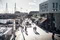 LIMASSOL, CYPRUS - DECEMBER 09, 2018: People out for a walk along the promenade. Limassol Marina