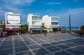 Limassol, Cyprus - Holiday apartment blocks and restaurant terraces at the old town square