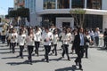 Brass band marching along the street Royalty Free Stock Photo