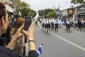 Woman making video of Greek Independence Day parade, Limassol, Cyprus