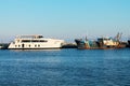 New cruise boat and old rusty ship in the port of Limassol Royalty Free Stock Photo