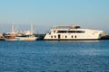 An old small ship and a new cruise boat in the port of Limassol Royalty Free Stock Photo