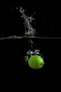Lime fell into the water Royalty Free Stock Photo