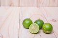 Lime. Fresh fruit on wood board background. Royalty Free Stock Photo