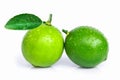 two whole fresh organic lime fruit Royalty Free Stock Photo