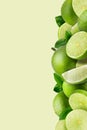 Lime fruit and Lime slices on green pattern background Royalty Free Stock Photo