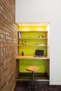 Lime green feature wall study nook in living room Royalty Free Stock Photo
