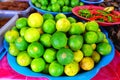 Lime or Green Lemon on the tray in the Vegetable shop. Royalty Free Stock Photo