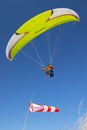 Lime green paraglide and a Wind Cone