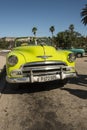Lime green vintage Chevrolet convertible taxi Havana