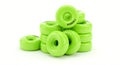 A stack of bright green roller skate wheels with black lettering on a white background Royalty Free Stock Photo