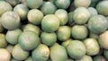 Lime heaps on the fruit shop display