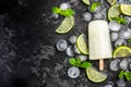 Lime juice homemade popsicle over ice Royalty Free Stock Photo