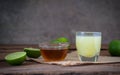 a Lime lemon with juice and honey in transparent glass with sac Royalty Free Stock Photo