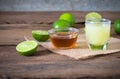 a Lime lemon with juice and honey in transparent glass with sac Royalty Free Stock Photo