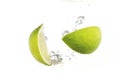 lime and lemon splashing water isolated on white background Royalty Free Stock Photo