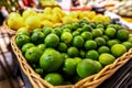 Lime and lemons background. Fresh organic lemons and lime on a local farmer food market on Bali island. Royalty Free Stock Photo