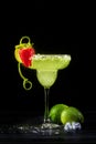 Lime Margarita with Salted Rim Strawberry Garnish Royalty Free Stock Photo