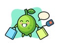 Lime mascot cartoon holding a shopping bag