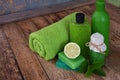 Lime mint composition beauty treatment products in green colors: shampoo, soap, bath salt, towel, oil. Various bath accessories. I Royalty Free Stock Photo