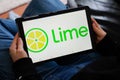 LIME screen tablet application hand logo of app rent bike e-Scooter rental electric scooter cycle company