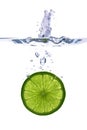 Lime slice falling into the water