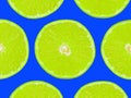 Lime slices on purple background, pop art style