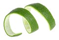 Lime zest isolated on white background. Lime twist. Citron Royalty Free Stock Photo