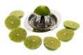 Limes with lemon squeezer