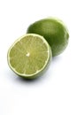 Limes on white background - close-up Royalty Free Stock Photo