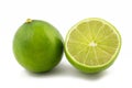 Limes, whole and in cross section Royalty Free Stock Photo