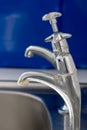 Limescale build-up on kitchen or bathroom faucet. Old chrome tap