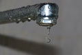 Limescale coating on plumbing. Water dripping from a faucet Royalty Free Stock Photo