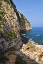 Limestome cliff falling into the mediterranee. Royalty Free Stock Photo