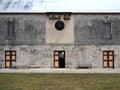 Limestone Building With Clock and Bells in The Keep Fortress at the National Museum of Bermuda Royalty Free Stock Photo