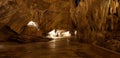 Limestone caves illuminated by artificial light