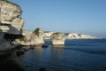 Limestone Cliffs seen from Bonifacio with Pertusato lighthouse. Corsica Island, France