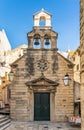 Limestone facade of small church in old town Dubrovnik in Croatia afternoon