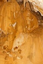Limestone formations on the wall of an underground cave. Royalty Free Stock Photo