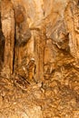 Limestone formations on the wall of an underground cave. Royalty Free Stock Photo